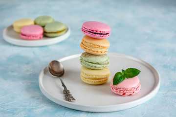 Colorful macarons cakes. Small French cakes. Sweet and colorful french macaroons.