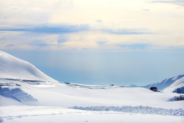 white clean snow mountain with sky background