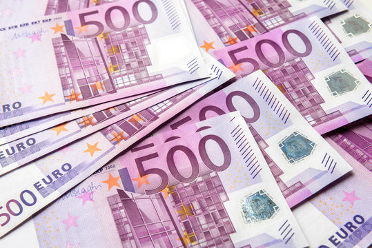 500 euro money banknotes background, top view of stack cash 