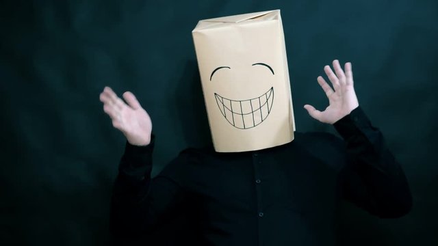 The concept of emotions. A man with a happy expression on his face. A raised thumb confirms a victory. Hopping with delight.