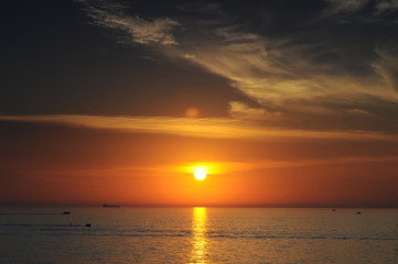 Travel to Slovenia.Travel to Slovenia. Red-orange stunningly beautiful sunset on the Adriatic Sea coast in Slovenia