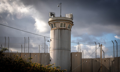 Guard tower and border wall between Israel and Palestine in Bethlehem