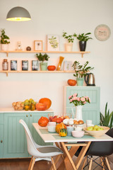 autumn kitchen decoration with pumpkins