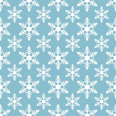 white snowflakes seamless pattern on blue background