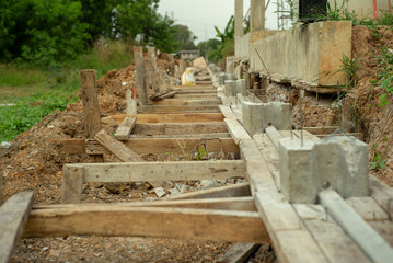 Fototapeta premium Selective focus picture of reinforcement steel of concrete structure at the construction site.