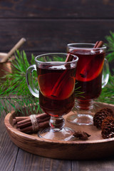 Mulled wine, cinnamon sticks, anise stars, fir cones and branches