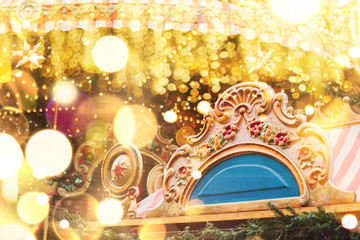 Festive concept. Christmas carousel with illuminations or decorations.