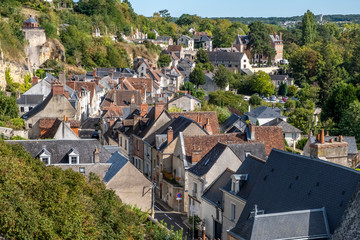 Fototapeta premium Panoramic view over roofs toward historic city center of Amboise, Loire valley, France.