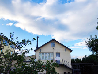 Outdoor in summer residence. The sky is clouded with clouds