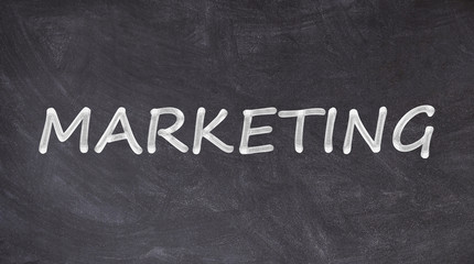 Fototapeta premium Marketing written on blackboard