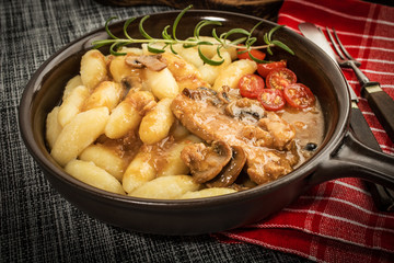 Braised pork chop with mushrooms.