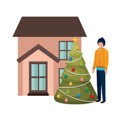 man with christmas tree outside the house