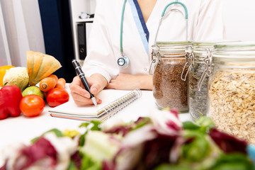 Vegetable diet nutrition and medication concept. Nutritionist offers healthy vegetables diet.