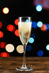 champagne glass on bokeh background