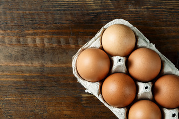chicken eggs in a paper tray