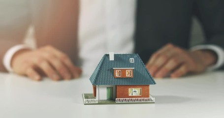 housing development - salesman offering new house to buy concept