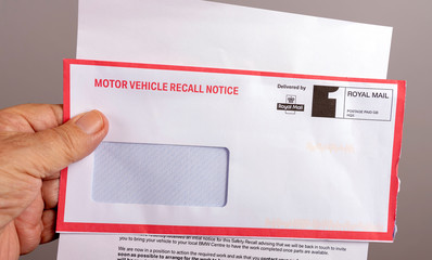 Official notification letter and envelope for a UK car safety recall - obrazy, fototapety, plakaty