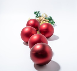 Christmas-tree decorations on a white background close-up