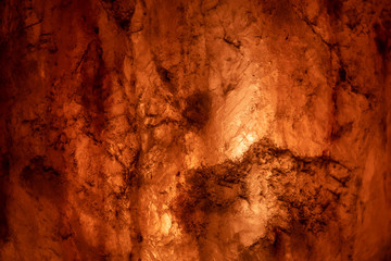 A solid piece of salt is translucent flash closeup