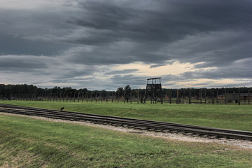 Railway and guard tower running through Auschwitz-Birkenau