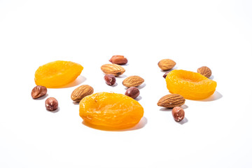 Dried apricots and nuts close up isolated