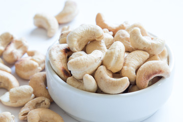 roasted cashew nuts on a white background