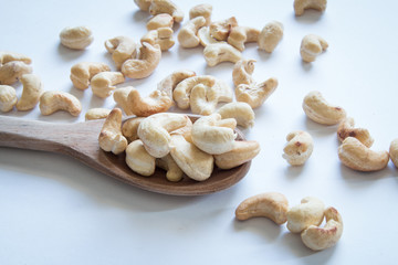 roasted cashew nuts on a white background