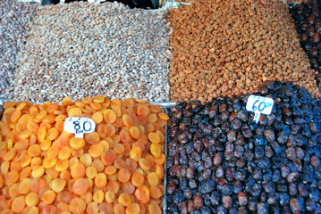 Dried fruit and nuts on market stall