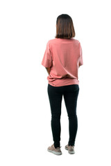 Full body of  Young girl with pink shirt looking back. Ideal for use in architectural designs