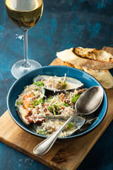 Mussels with Blue Cheese Sauce and Garlic Baguette.