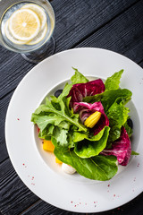 Salad mix with cherry tomatoes, sweet peppers, olives and Ciligini cheese.