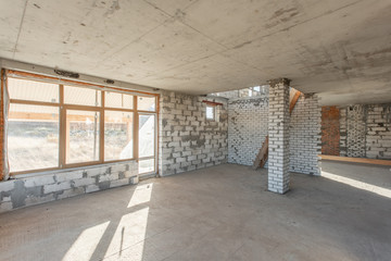 The second attic floor of the house. overhaul and reconstruction. Working process of warming inside part of roof. House or apartment is under construction, remodeling, renovation, restoration.