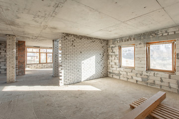 The second attic floor of the house. overhaul and reconstruction. Working process of warming inside part of roof. House or apartment is under construction, remodeling, renovation, restoration.