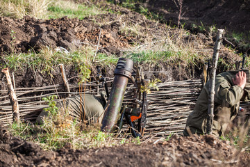 Soldiers during mortar shooting
