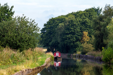 Narrow boat on the Trent and Mersey canal in Cheshire UK
