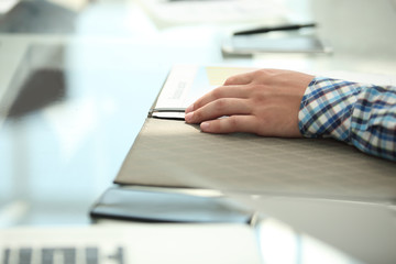 background image of a businessman sitting at his Desk