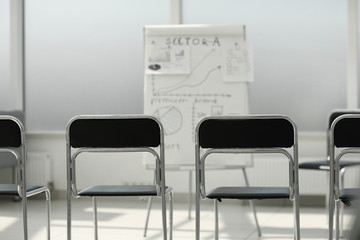 row of chairs in the conference room.