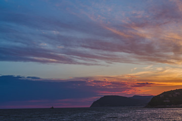 Naklejka na ściany i meble Beautiful sunset over the black sea coast