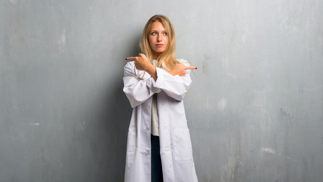 Young Doctor Woman Pointing To The Laterals Having Doubts. Undecided Person