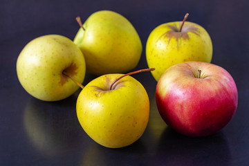 Apples on a dark background