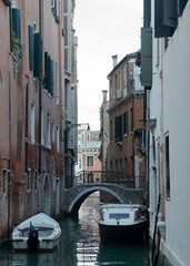 Fototapeta na wymiar Venice, Italy. View of ancient buildings and narrow canal in Santa Croce