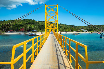 Yellow bridge between the islands of Nusa Cheningan and Nusa Lembongan - Powered by Adobe