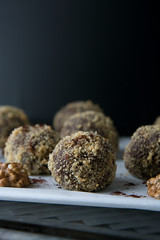 Energy healthy homemade truffles. Uncooked sweet balls made from walnuts and biscuits.