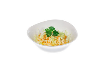  salad with cabbage in a plate isolate. decorated with greens. restaurant feed