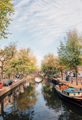 Fototapeta na wymiar A bridge on a Canal in Amsterdam