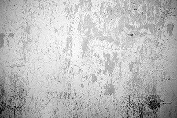 The texture of the old cracked grey wall. Nice background.