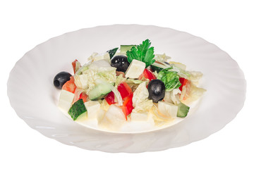 Greek salad in a plate. isolate. decorated with greens. restaurant feed