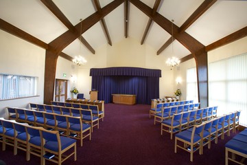 Interior of a crematorium chapel set out for a funeral service