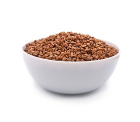 Buckwheat in white bowl isolated on white background.
