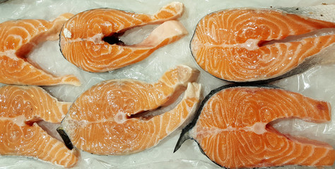 Fresh salmon steak on ice